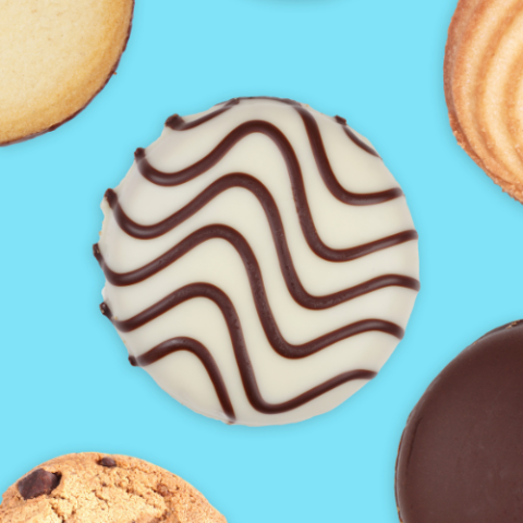 bright background with cookies of various flavors and colors and designs cover the page.